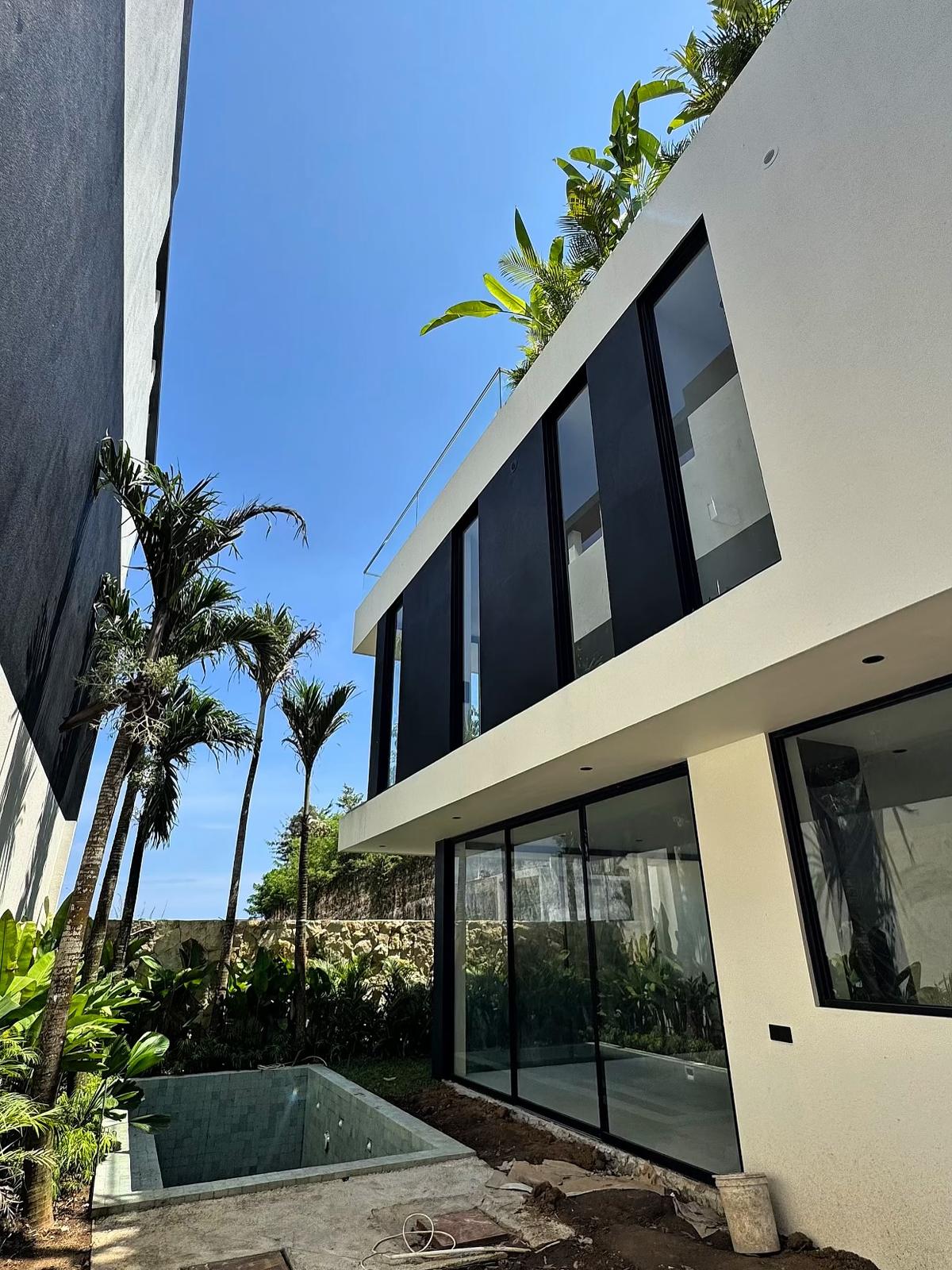 A finished villa with pool and gardens